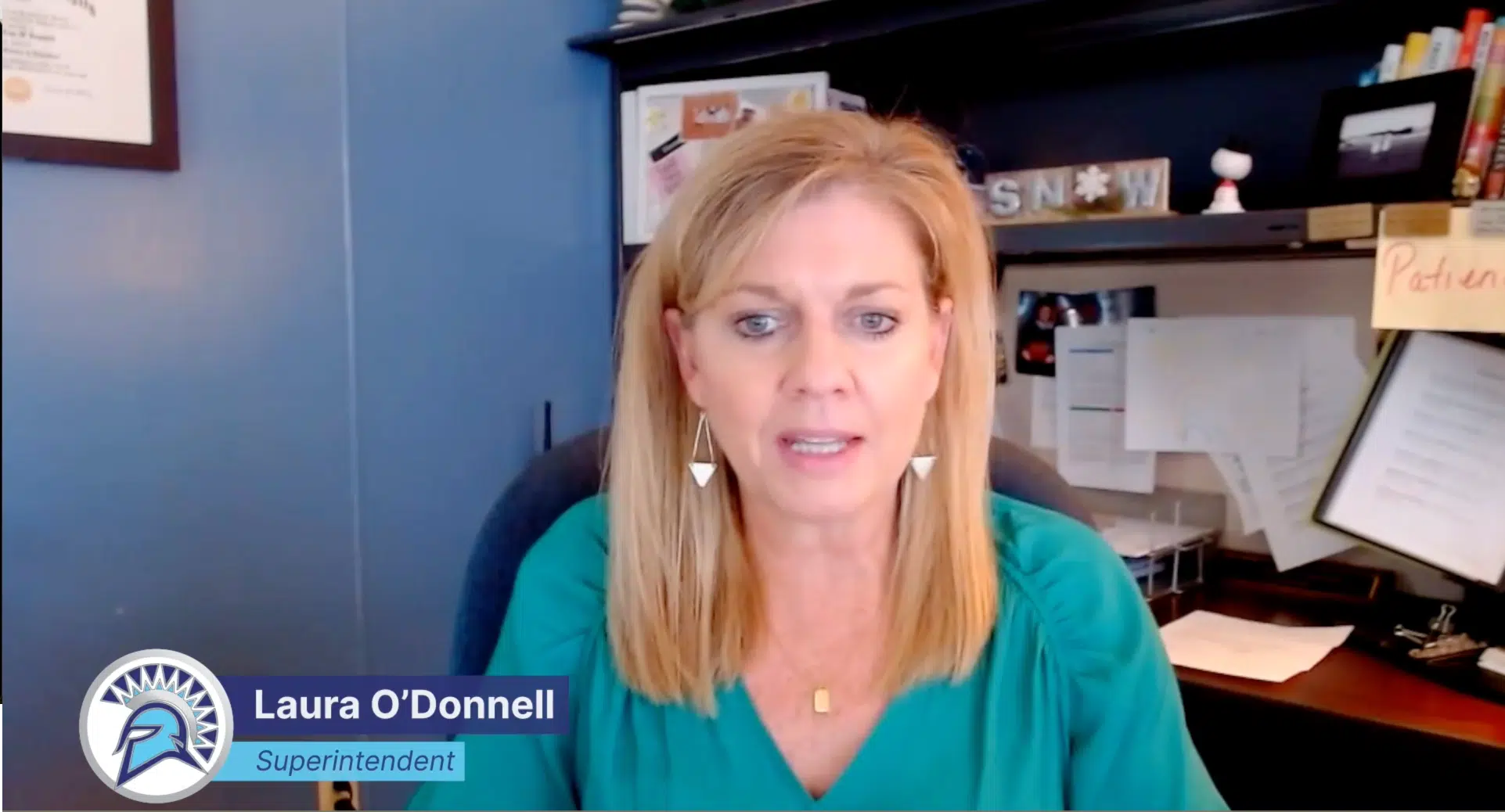 Screenshot from video. Laura O'Donnell, Superintendent on screen with name overlayed in lower left corner
